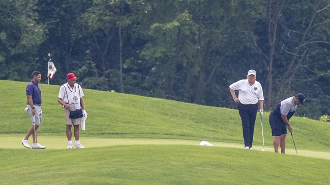 US President Donald Trump plays golf at Trump National Golf Club in Virginia on Saturday (Sunday AEST). Picture: AFP