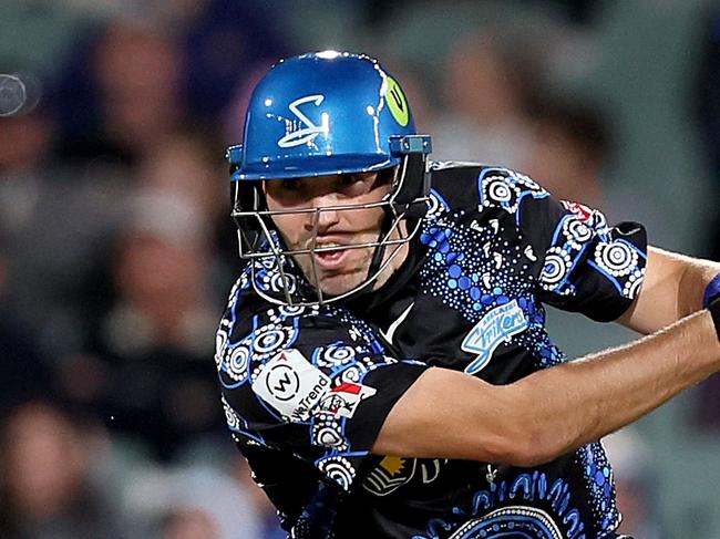 ADELAIDE, AUSTRALIA - DECEMBER 27: Jamie Overton of the Strikers plays a shot during the BBL match between Adelaide Strikers and Hobart Hurricanes at Adelaide Oval, on December 27, 2024, in Adelaide, Australia. (Photo by James Elsby/Getty Images)