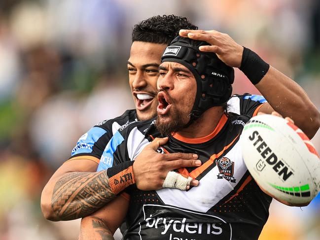 TAMWORTH, AUSTRALIA - MAY 11: Isaiah Papali'i of the Tigers celebrates a try with team mates during the round 10 NRL match between Wests Tigers and Newcastle Knights at Scully Park, on May 11, 2024, in Tamworth, Australia. (Photo by Mark Evans/Getty Images)