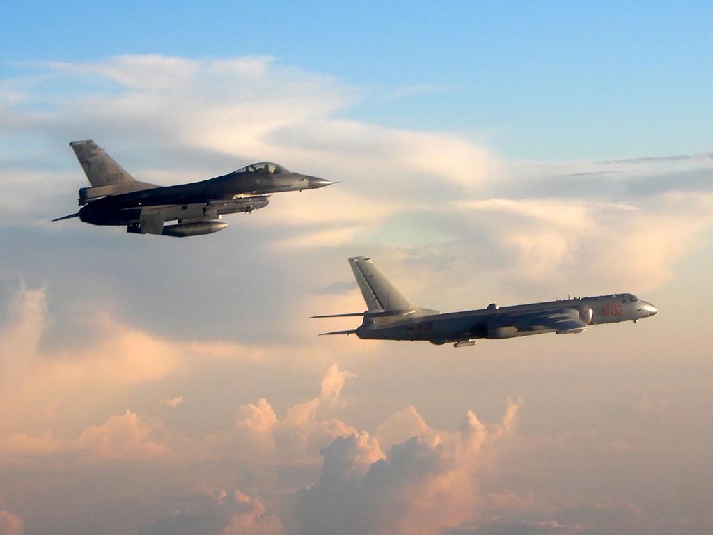 A Taiwan F-16 fighter, left, monitors a Chinese H-6 bomber in 2018. Picture: Taiwan Defence Ministry/AFP