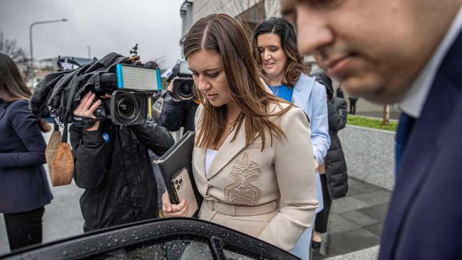 Brittany Higgins leavescourt with her partner David Sharaz after day two of the trial.