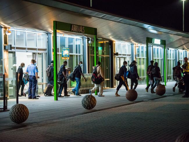 Vanuatan fruit pickers arrive at Hobart airport, ahead of two weeks of quarantine, before returning to Victoria to begin work. 19/03/2021 Image: Agriculture Victoria/Chris Crerar