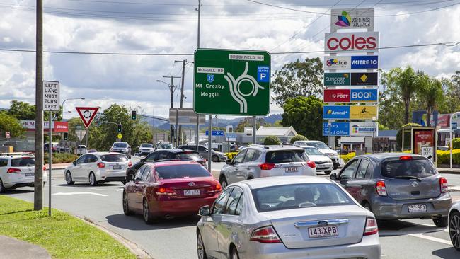 Traffic is always a problem at the Kenmore roundabout but $12.5 million has been pledged to upgrade it. Picture: AAP/Richard Walker