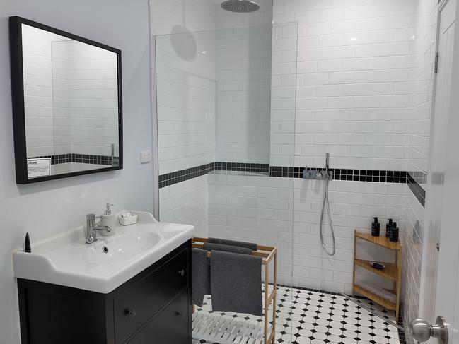 A bathroom in one of the renovated rooms. Picture: Toby Zerna