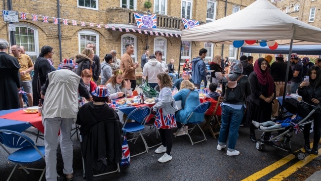 Local and main roads were closed as families held their own lunch to mark the occassion. Picture: Mike Kemp/In Pictures via Getty Images