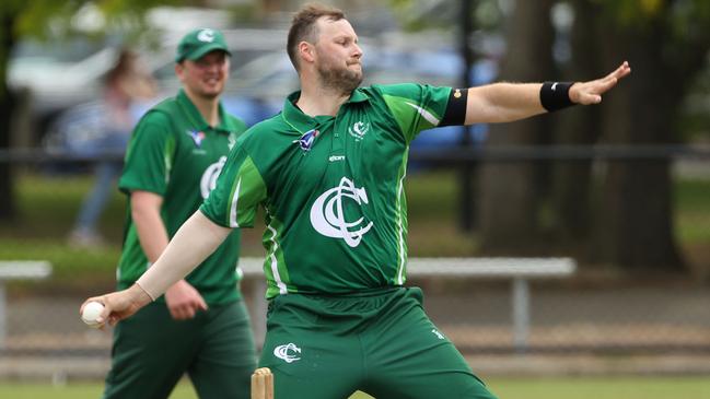 Tom McQuinn bowling for Croydon. Picture: Stuart Milligan