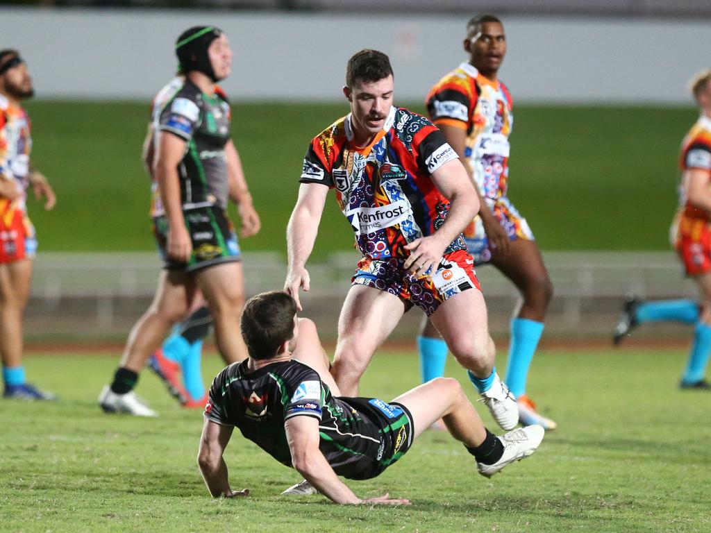 Northern Pride's Ewan Moore flattens a Blackhawks player. Picture: Matthew McInerney