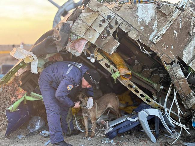 Emergency specialists work at the crash site near Aktau. Picture: AFP