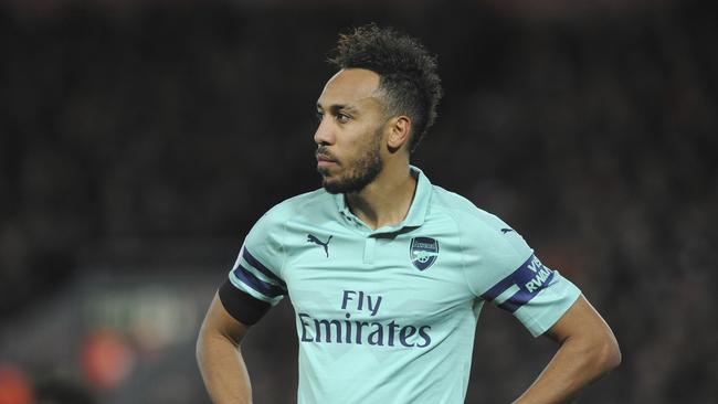 Arsenal's Pierre-Emerick Aubameyang waits as a Liverpool penalty is taken during the English Premier League soccer match between Liverpool and Arsenal at Anfield in Liverpool, England, Saturday, Dec. 29, 2018. (AP Photo/Rui Vieira)