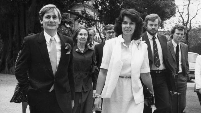 John Bannon and wife Angela walk through the garden at Government House for his swearing-in as Premier on November 10, 1982. That’s a very young Mike Rann on the right.