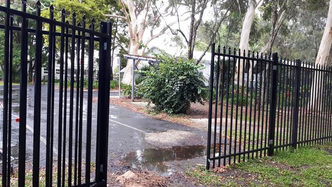 The fence at the back of the village. Photo by Janine Watson