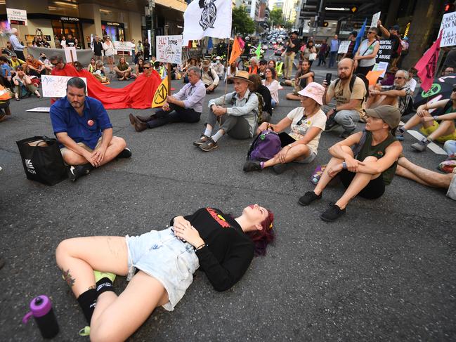 Protesters block an intersection during the Extinction Rebellion protest in Brisbane. Picture: Dan Peled/NCA NewsWire