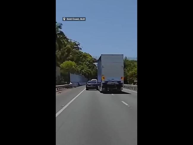 Dashcam captures dramatic moment semi-truck merges into car