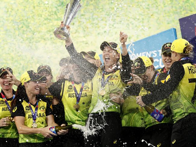 *APAC Sports Pictures of the Week - 2020, March 9* MELBOURNE, AUSTRALIA - MARCH 08: Meg Lanning of Australia holds aloft the championship trophy and celebrates with team mates after winning the ICC Women's T20 Cricket World Cup Final match between India and Australia at the Melbourne Cricket Ground on March 08, 2020 in Melbourne, Australia. (Photo by Ryan Pierse/Getty Images)