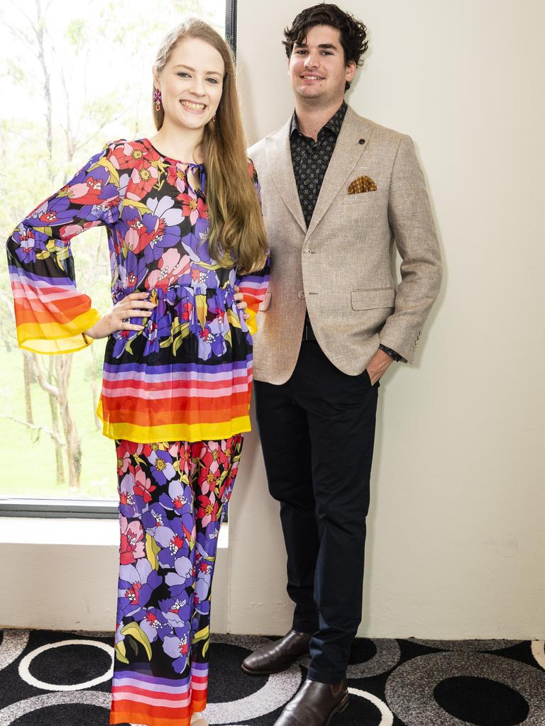 Models Sophie Gull and Josh Smith prepare for the runway for the Kaye Foley Modelling Academy and Agency show at the Melbourne Cup luncheon hosted by Rotary Club of Toowoomba City raising funds for Protea Place, Tuesday, November 1, 2022. Picture: Kevin Farmer