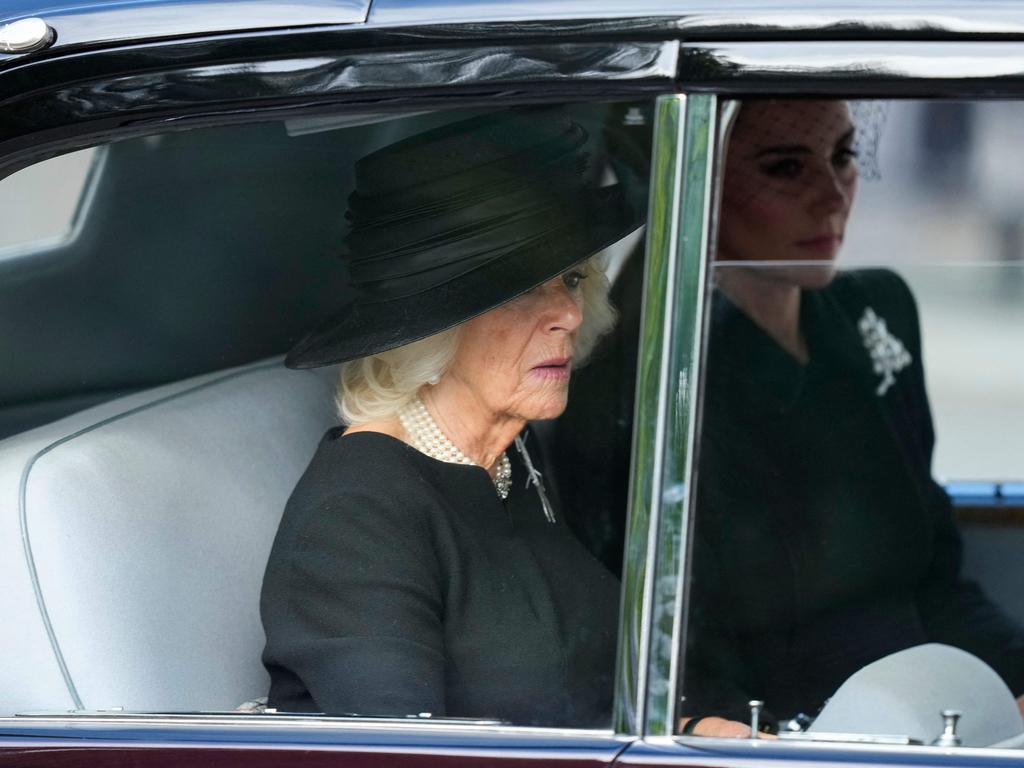 Camilla, the Queen Consort, sits next to the Princess of Wales on the way to the service. Picture: AFP.