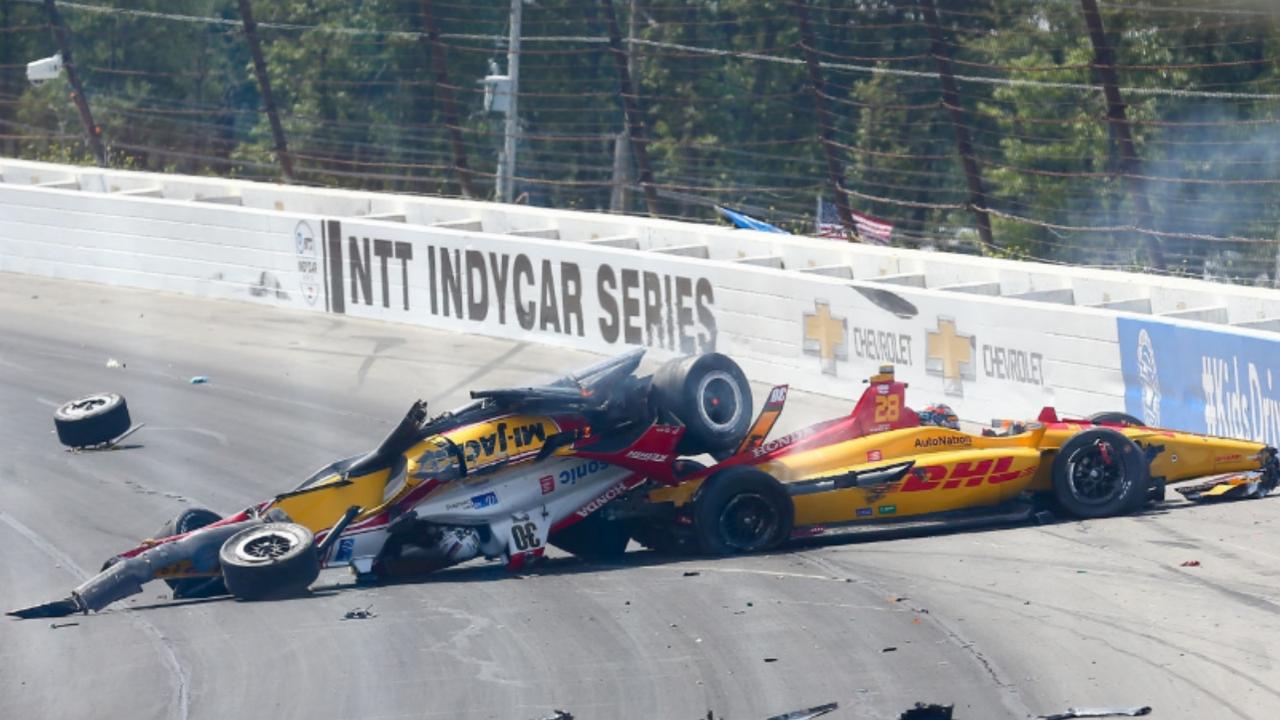 Sato's car comes to rest on Hunter-Reay's.