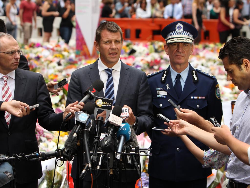 19. Premier Mike Baird joined Police Commissioner Andrew Scipione in Martin Place to say the city had been tested by the siege but the despair was being replaced by the “emergence of hope”. Picture: Tim Hunter