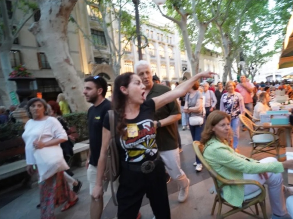 Thousands of anti-tourism protesters jeered and booed at holidaymakers dining out in Palma. They took to the streets to vent their anger over tourist saturation. Picture: Solarpix