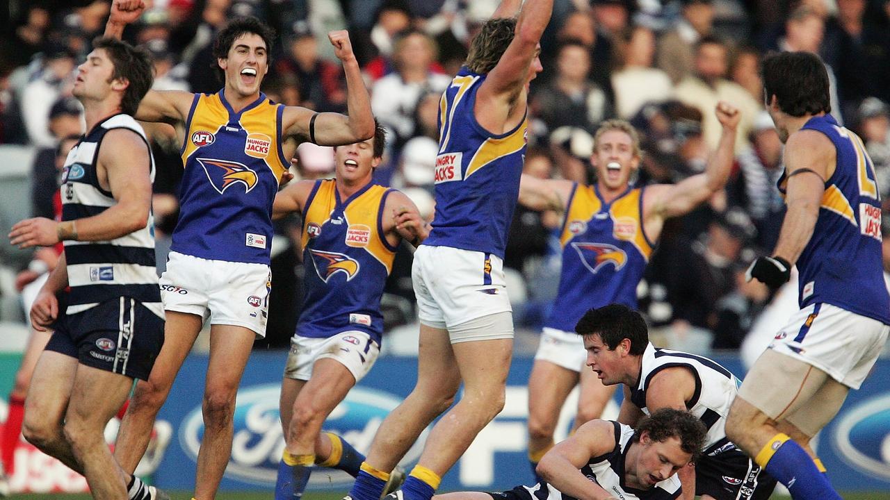 Daniel Chick of the Eagles celebrates while the Cats looks dejected. Picture: Ryan Pierse