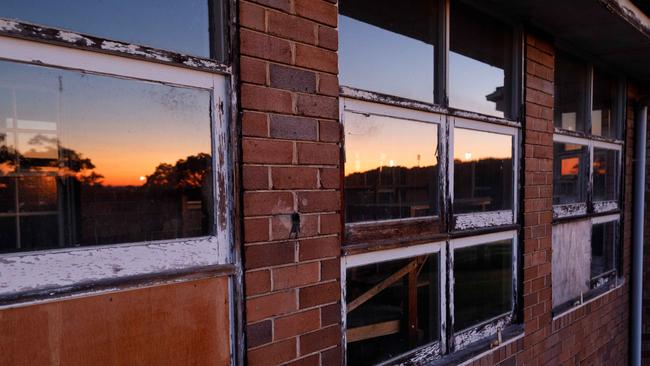 The root of the problem traces back to the closure of long-stay mental hospitals decades ago, including Sydney’s old Rozelle Hospital, a former mental asylum that has been left to crumble since shutting down. Picture: Max Mason-Hubers