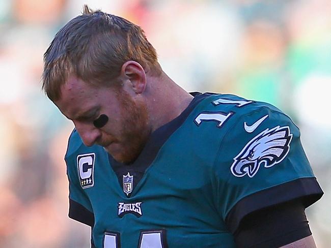 PHILADELPHIA, PA - OCTOBER 21: Quarterback Carson Wentz #11 of the Philadelphia Eagles reacts after losing possession of the ball late in the fourth quarter against the Carolina Panthers at Lincoln Financial Field on October 21, 2018 in Philadelphia, Pennsylvania. The Panthers won 21-17.   Mitchell Leff/Getty Images/AFP == FOR NEWSPAPERS, INTERNET, TELCOS & TELEVISION USE ONLY ==