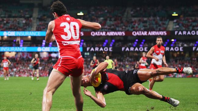 Caldwell falls to the ground after the heavy collision. Picture: Matt King/AFL Photos/via Getty Images