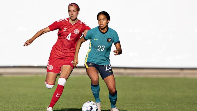 The Matildas’ Mary Fowler (right) and Denmark's Rikke Sevecke battle for possession in the Danes’ 3-2 win. Picture: Henning Bagger / Ritzau Scanpix / AFP