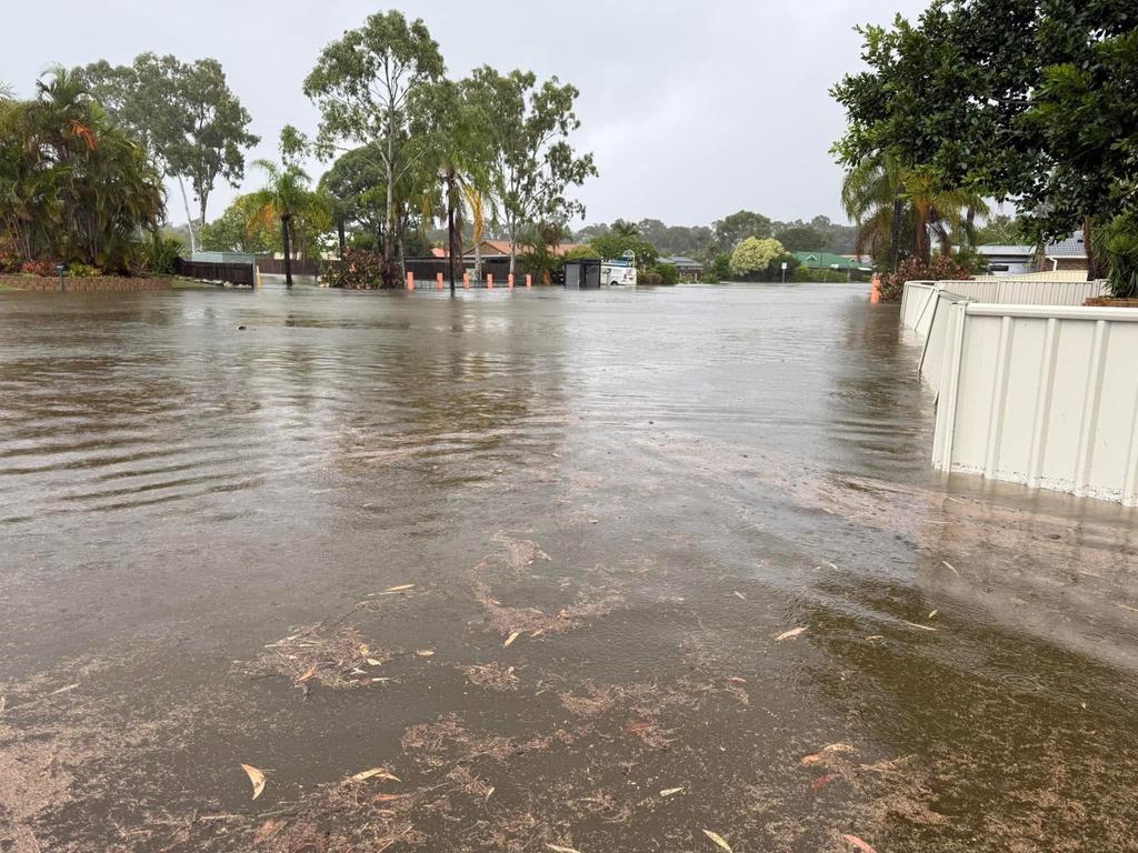 Flooding on Ibis Boulevard in Eli Waters during the wild weather brought by ex-Tropical Cyclone Alfred. Photo: Chris Bergin
