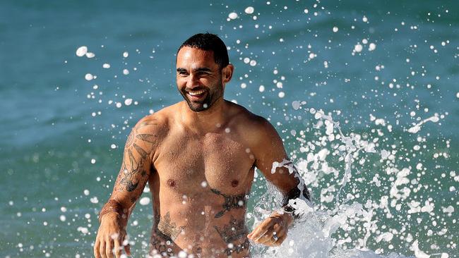 Hawthorn’s Shaun Burgoyne takes a swim at Coogee in Sydney on Monday after their Sunday game against the Giants. Picture. Phil Hillyard