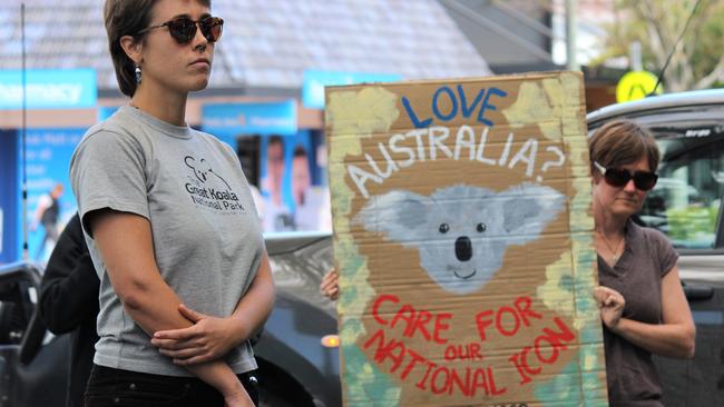 Ruby Oliver-King and others protesting outside Mr Singh's office in Coffs Harbour. Picture: Tim Jarrett