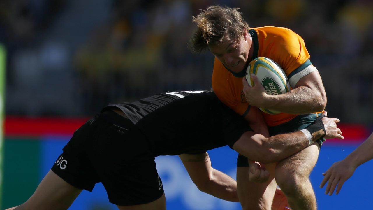 Michael Hooper of the Wallabies gets tackled during the Bledisloe Cup match in Perth last September. (Photo by James Worsfold/Getty Images)