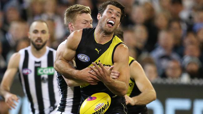 Alex Rance is tackled by Jordan De Goey. Picture: Michael Klein