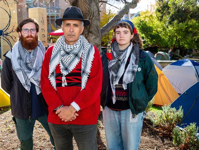 University of Tasmania lecturer Adel Yousif with sociology student Owen Gregory and marine biology masters student Hannah Levit at the encampment on the UTAS Sandy Bay Campus, which is a peaceful protest to draw attention to the war in Gaza.Picture: Linda Higginson