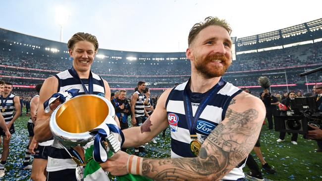 MELBOURNE, AUSTRALIA - SEPTEMBER 24: Zach Tuohy of the Cats celebrates with the Premiership Cup during the 2022 Toyota AFL Grand Final match between the Geelong Cats and the Sydney Swans at the Melbourne Cricket Ground on September 24, 2022 in Melbourne, Australia. (Photo by Daniel Carson/AFL Photos via Getty Images)