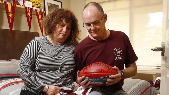 The parents of Patrick Cronin, Robyn and Matt, in his bedroom. Picture: David Caird