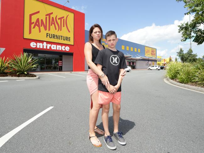 Latest victim ... Jaclyn Gross and her 11-year-old son Trae McGovern were at a friend's house when a Fantastic Furniture chair cut off a third of his toe. Picture: Luke Marsden