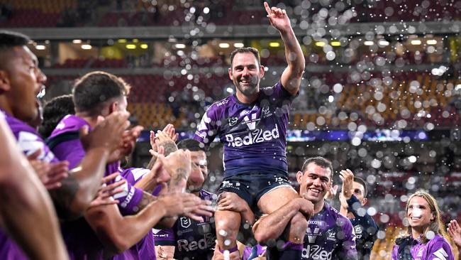 Cameron Smith was chaired off the field by his teammates after the win against Canberra, but he admits he doesn’t know if the grand final will be his last game. Picture: Getty Images