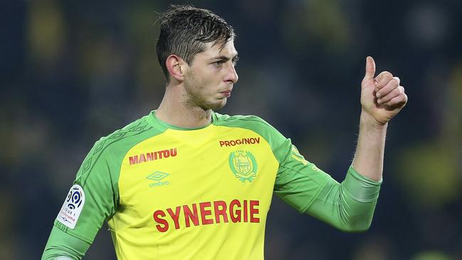 In this his picture taken on Jan. 14, 2018, Argentine soccer player, Emiliano Sala, of the FC Nantes club, western France, gives a thumbs up during a soccer match against PSG in Nantes, France. The French civil aviation authority says Emiliano Sala was aboard a small passenger plane that went missing off the coast of the island of Guernsey. (AP Photo/David Vincent)