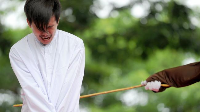 Two Gay Men Caned In Indonesia For Having Sex Au — Australias Leading News Site