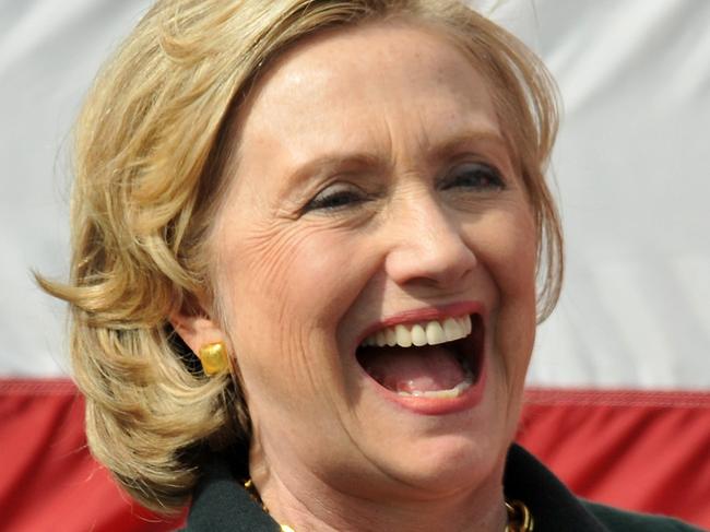 INDIANOLA, IA - SEPTEMBER 14: Former Secretary of State Hillary Rodham Clinton has a hearty laugh during the 37th Harkin Steak Fry, September 14, 2014 in Indianola, Iowa. This is the last year for the high-profile political event as Sen. Tom Harkin (D-IA) plans to retire. Steve Pope/Getty Images/AFP == FOR NEWSPAPERS, INTERNET, TELCOS & TELEVISION USE ONLY ==