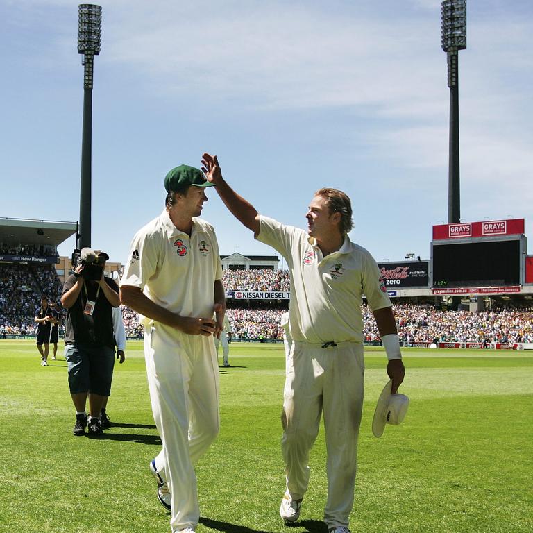 Glenn McGrath and Shane Warne leave the field for the final time after Australia wrapped up the English innings in 2007. Phil Hillyard