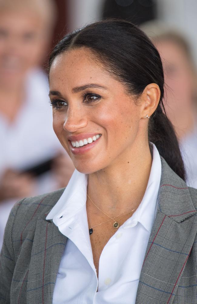 Meghan kept her hair and makeup simple and casual for her visit to Dubbo. Picture: Dominic Lipinski — Pool/Getty Images