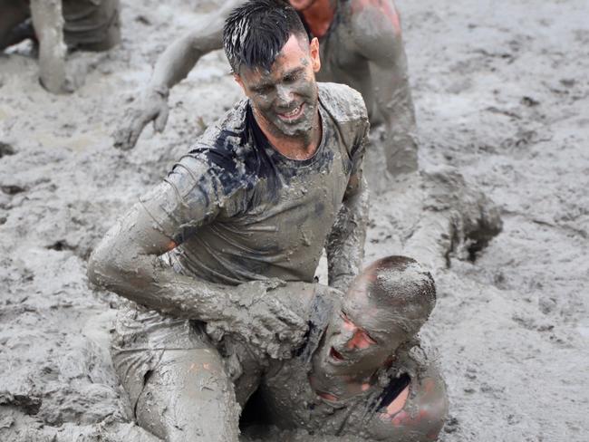 Richmond AFL team doing Tough Mudder course in QLD on Thursday.  Trent Cotchin  and Dusty Martin.  Please credit Molly Stapleton/Richmond FC..