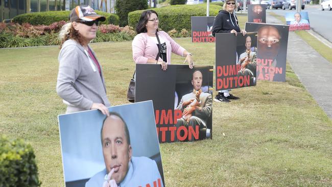 Protestors outside Peter Dutton’s electorate office on Saturday. Picture: Mark Cranitch