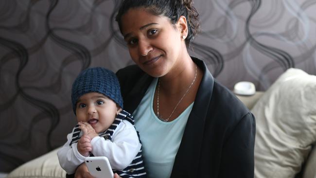 Pamela Bonney, with baby Miguel, successfully challenged a use mobile while driving charge after police told her they had her on video but wouldn't show her.