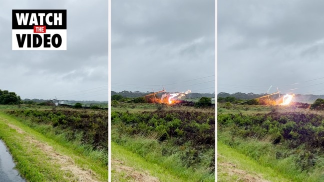 Sparks fly as rotten power pole collapses