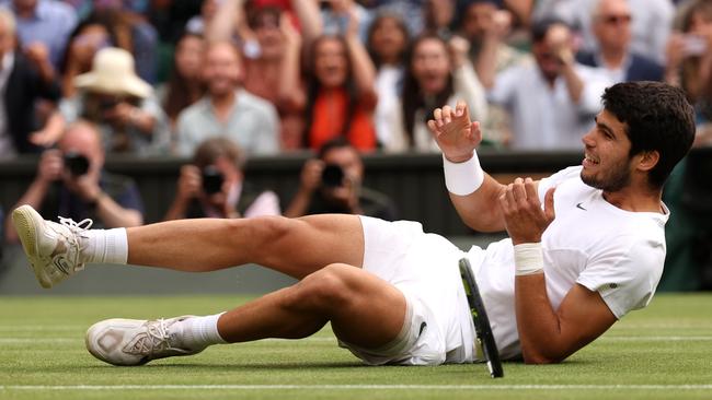 Carlos Alcaraz celebrates beating winning the Wimbledon men's final. Picture: Julian Finney/Getty Images