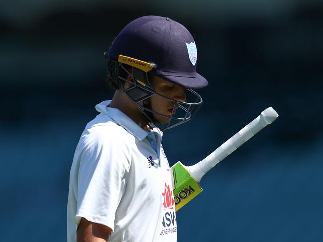 SYDNEY, AUSTRALIA - FEBRUARY 19: Sam Konstas of the Blues walks off the field after been dismissed by Scott Boland of Victoria during the Sheffield Shield match between New South Wales Blues and Victoria at Sydney Cricket Ground on February 19, 2025 in Sydney, Australia. (Photo by Jason McCawley/Getty Images)