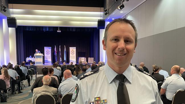 Sergeant Michael Coad was awarded the National Emergency Medal at a ceremony on the Gold Coast. Photo: Madeleine Graham.